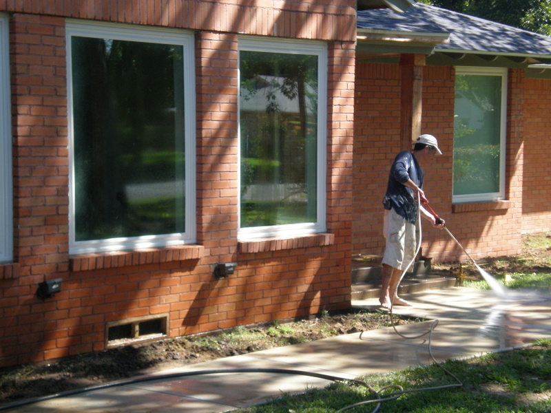 Pressure washing exterior residential brick