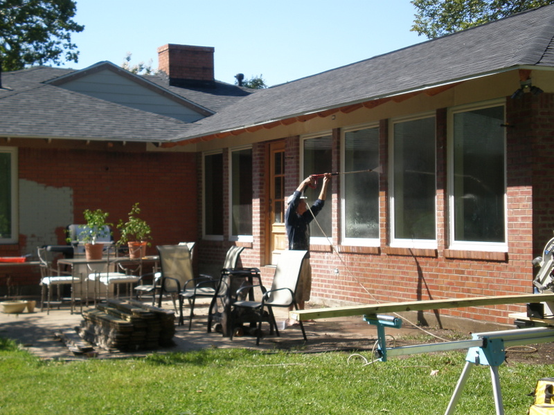 Additional pressure washing of exterior brick home
