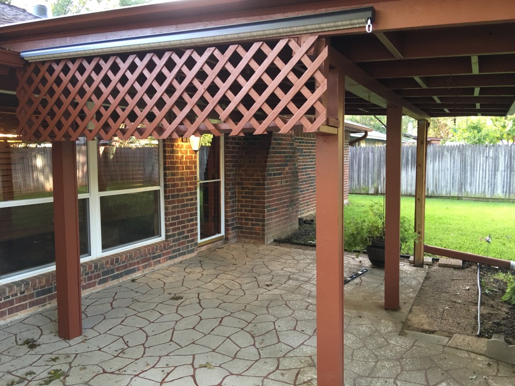 The start of an exterior residential remodel for a patio enclosure