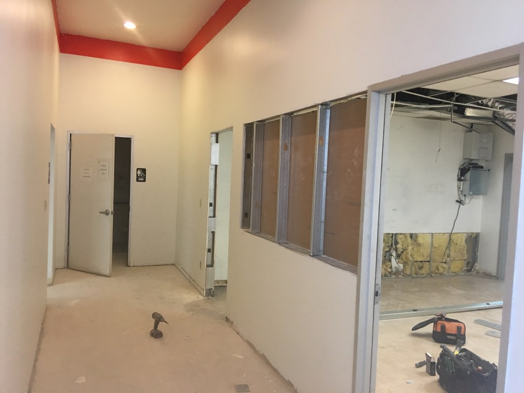 Repairing and painting all of the interior walls.