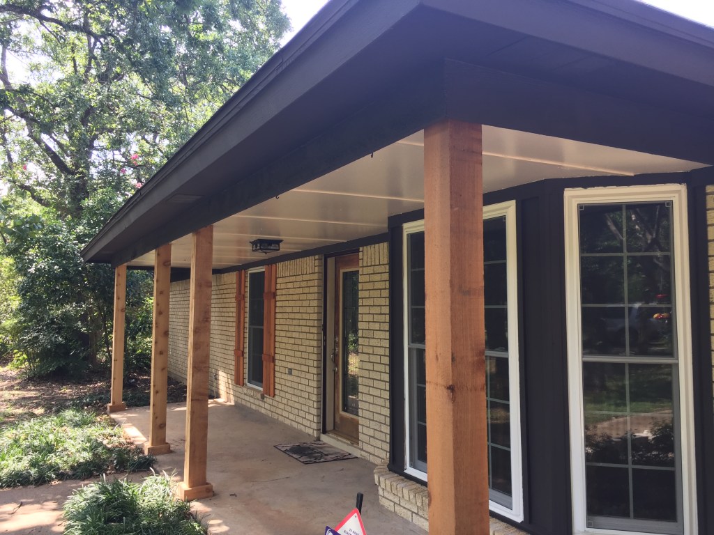 Painted exterior siding, porch posts and trim on a Landmark Property Services project