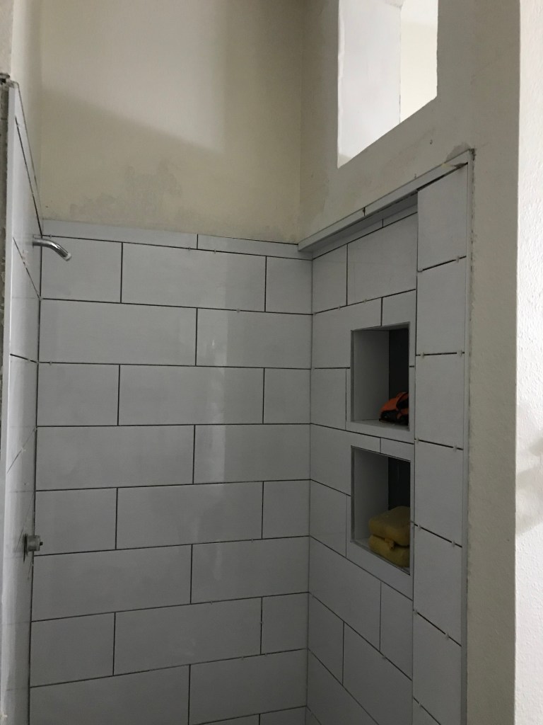 Our shower remodel is almost complete. New ceramic wall tile and the flooring is next