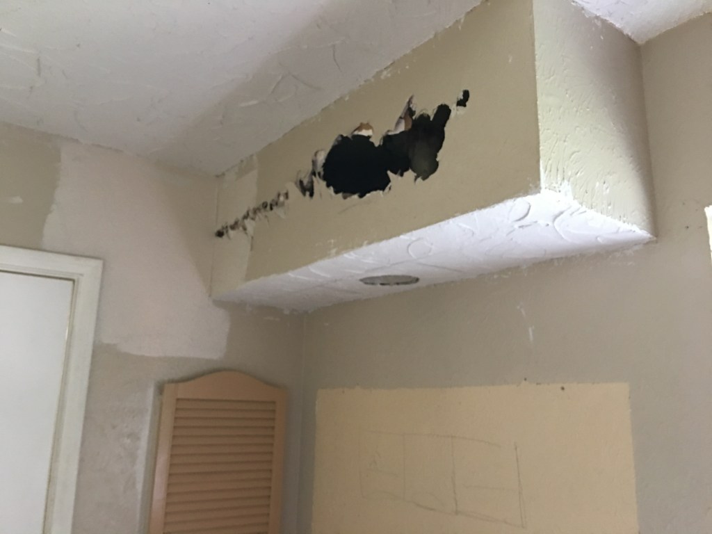 Removing the old drywall so we can install new sheetrock and tape and bedding along with crowsfoot texture.