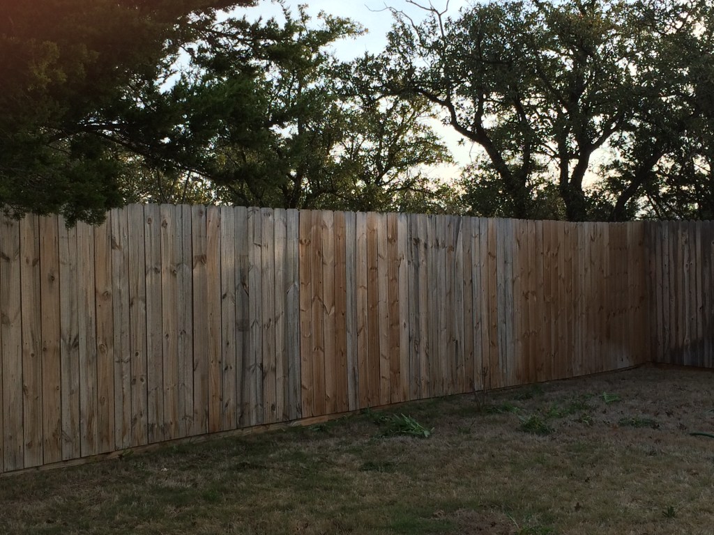 After pressure washing the fence